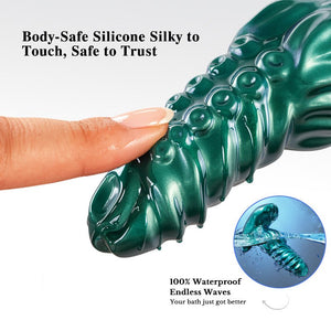 Green silicone product with a finger touching it, labeled as body-safe and waterproof.