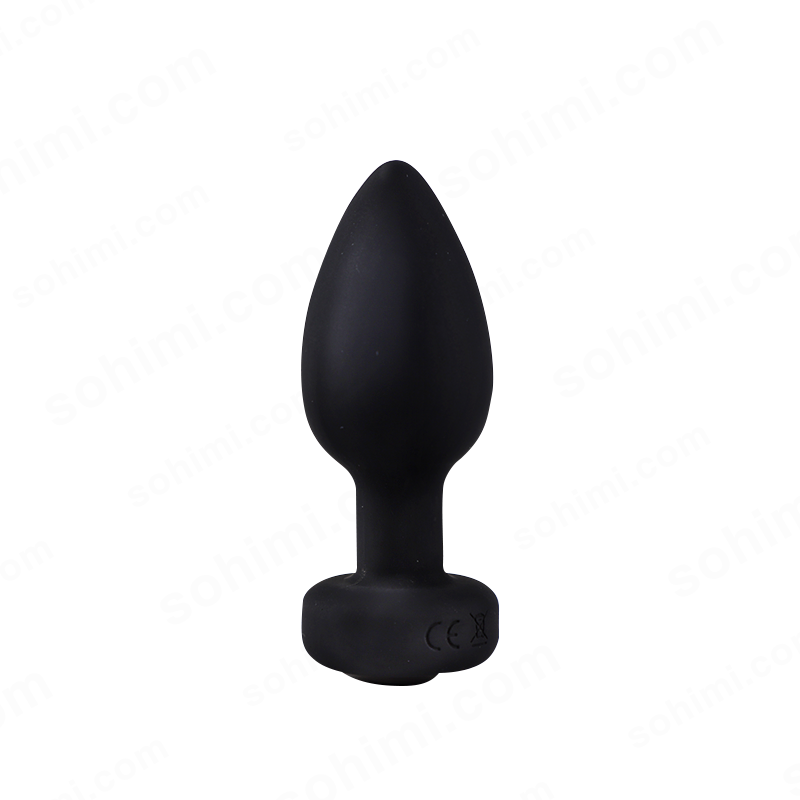 Black silicone butt plug on a white background