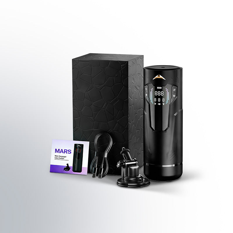 Black electronic device with packaging and accessories on a light gray background