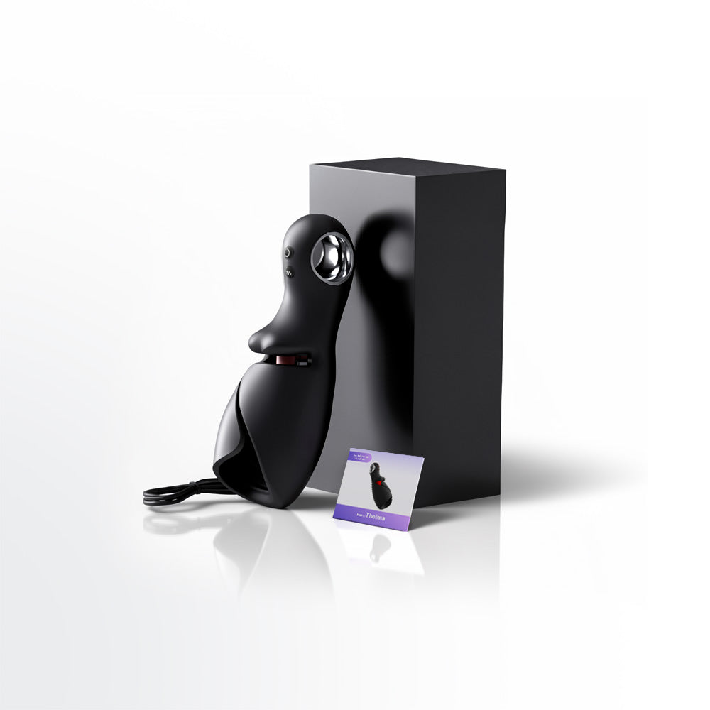 Black electronic device with packaging and manual on a white background